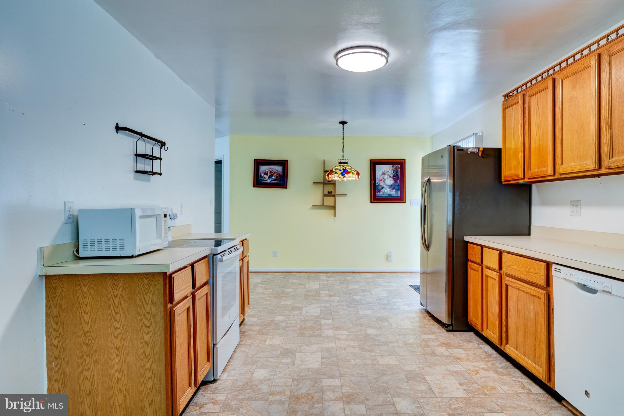 12380 Lewistown Road Cordova, MD 21625 - Photo 16 of 50 Kitchen, towards eat-in area beyond frig