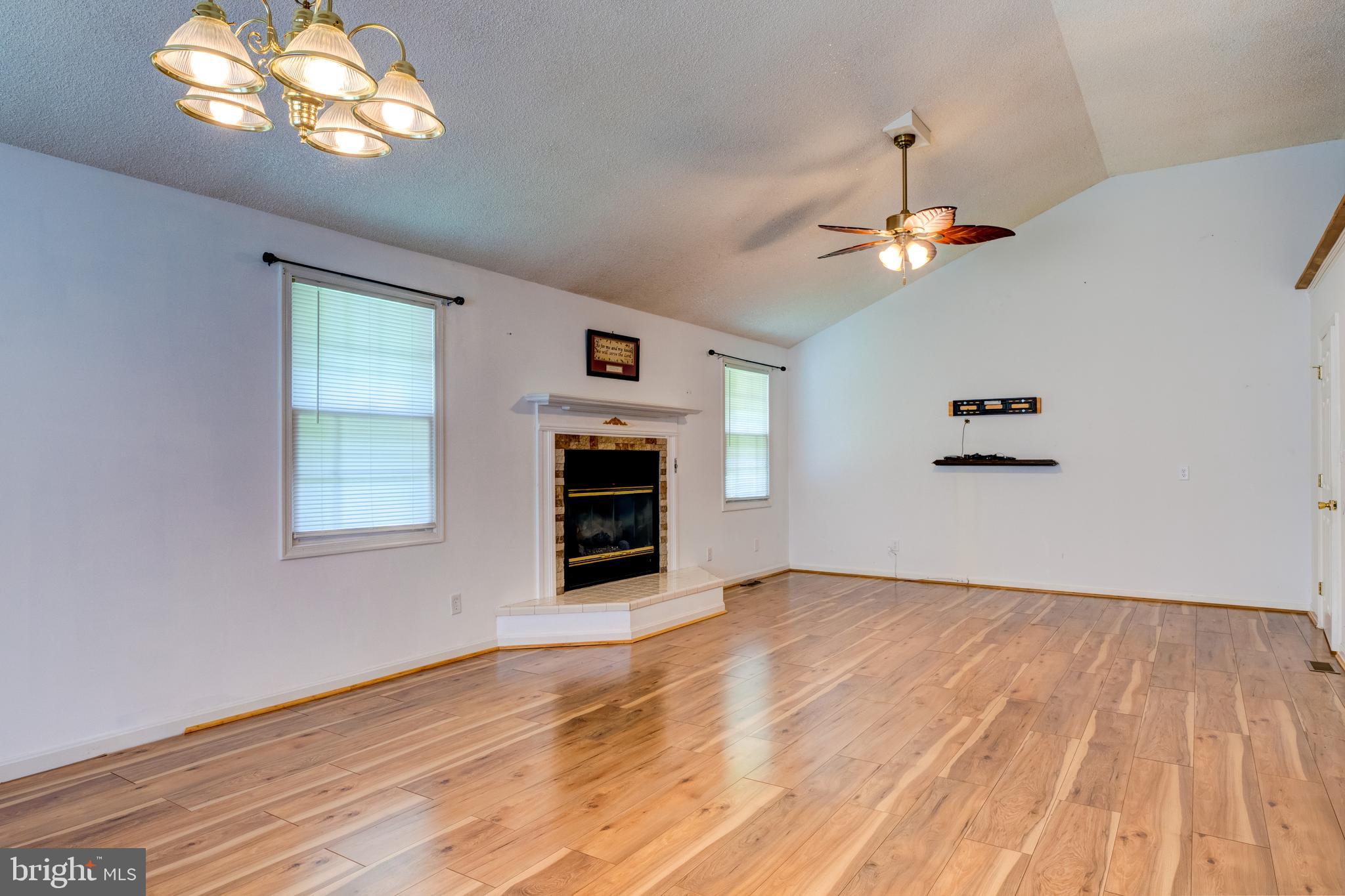 12380 Lewistown Road Cordova, MD 21625 - Photo 18 of 50 Combined DR/LR, vaulted ceiling