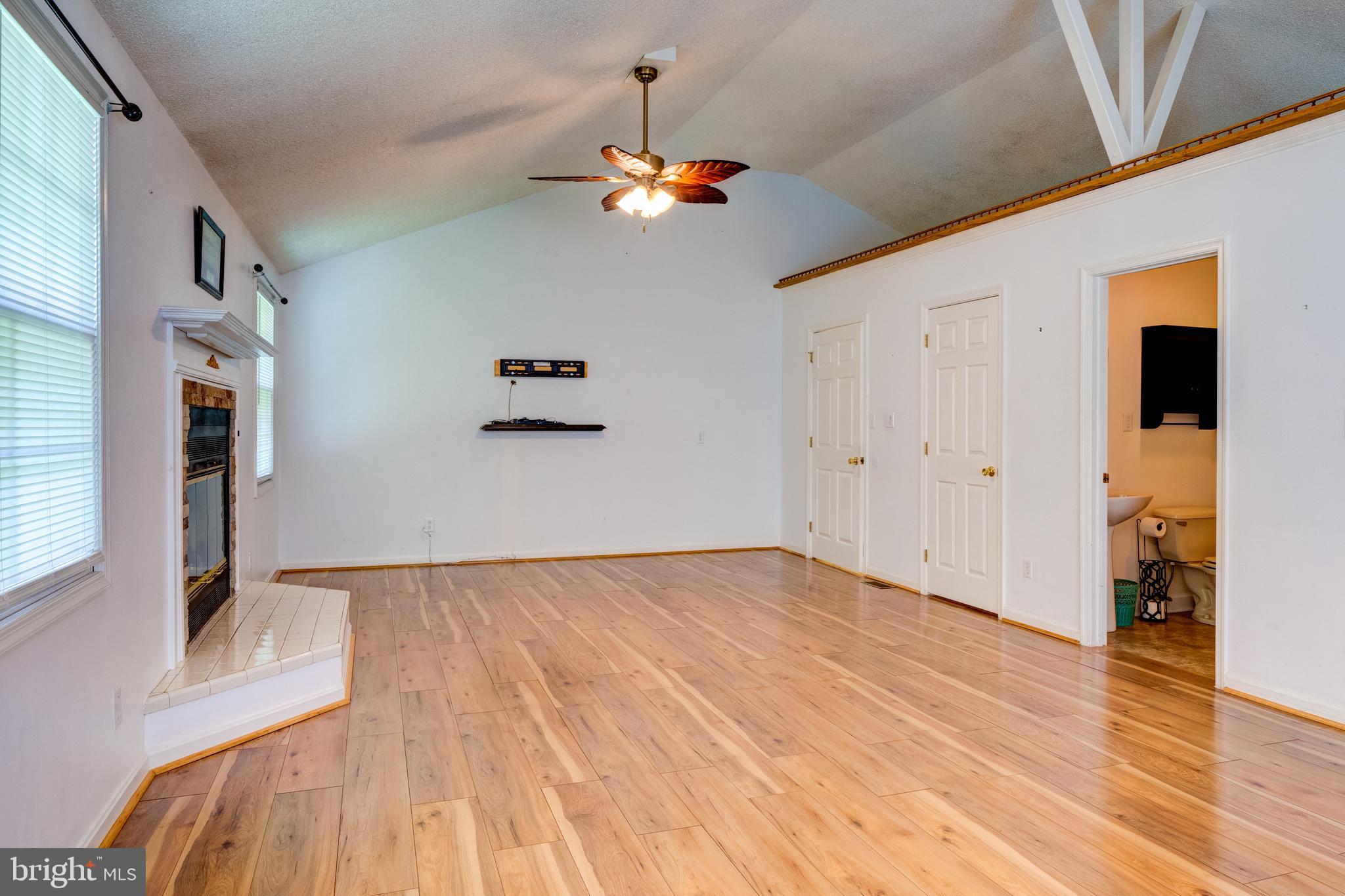 12380 Lewistown Road Cordova, MD 21625 - Photo 19 of 50 Combined DR/LR, vaulted ceiling