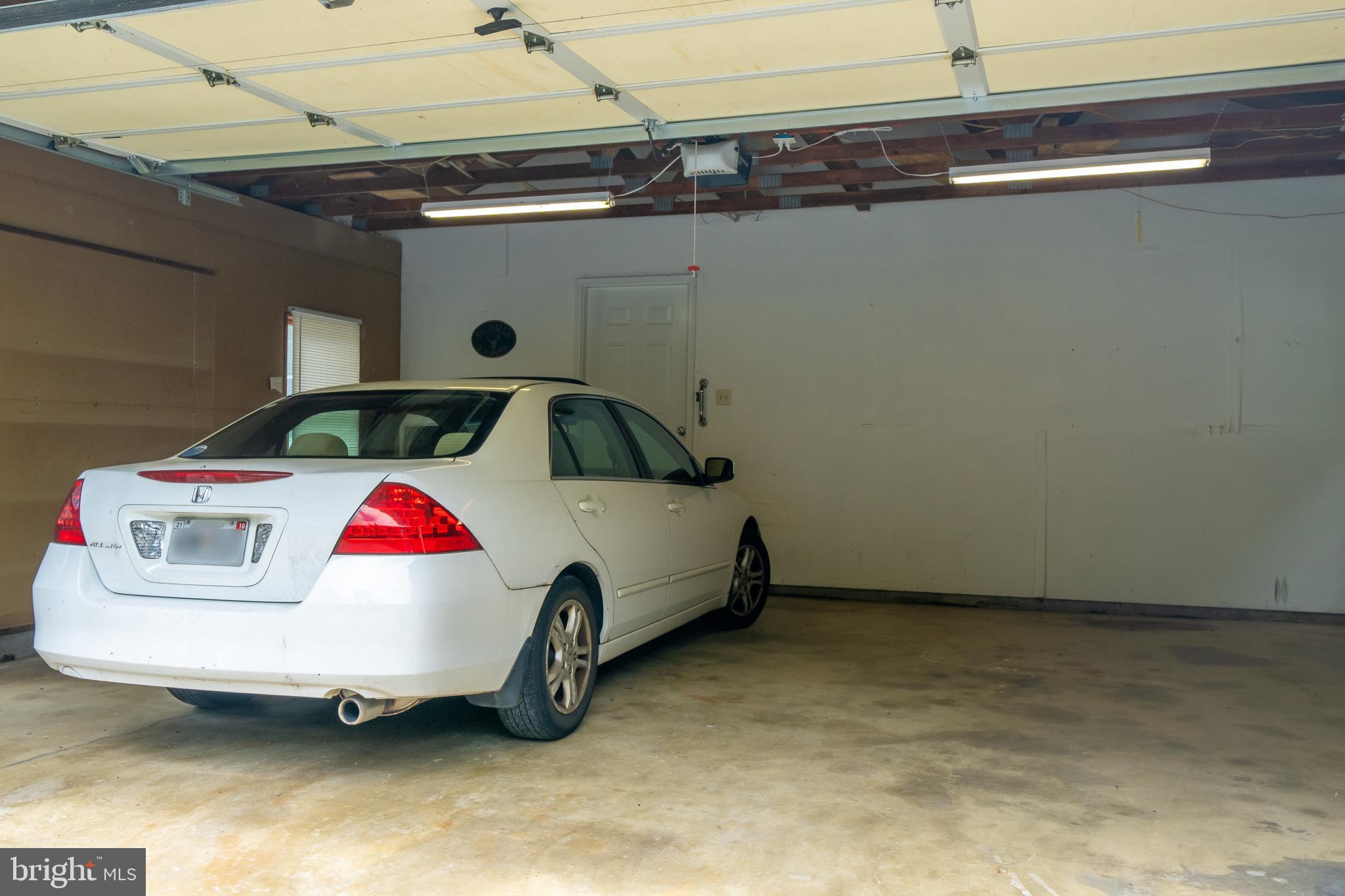 12380 Lewistown Road Cordova, MD 21625 - Photo 38 of 50 Car in oversized 2-car garage; space for storage