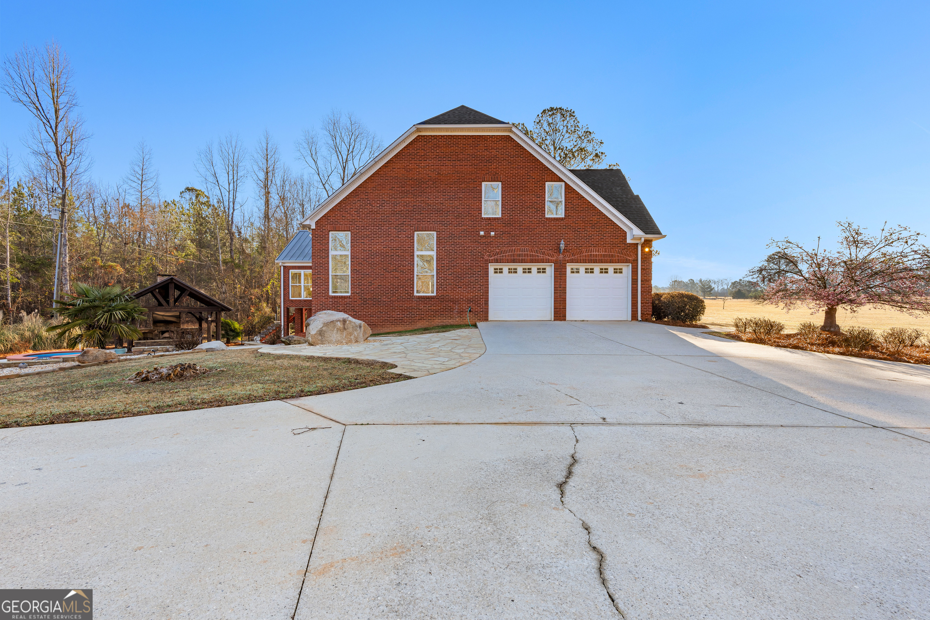 4101 West Ellis Road Griffin, GA 30223 - Photo 113 of 133 a front view of a house with a yard