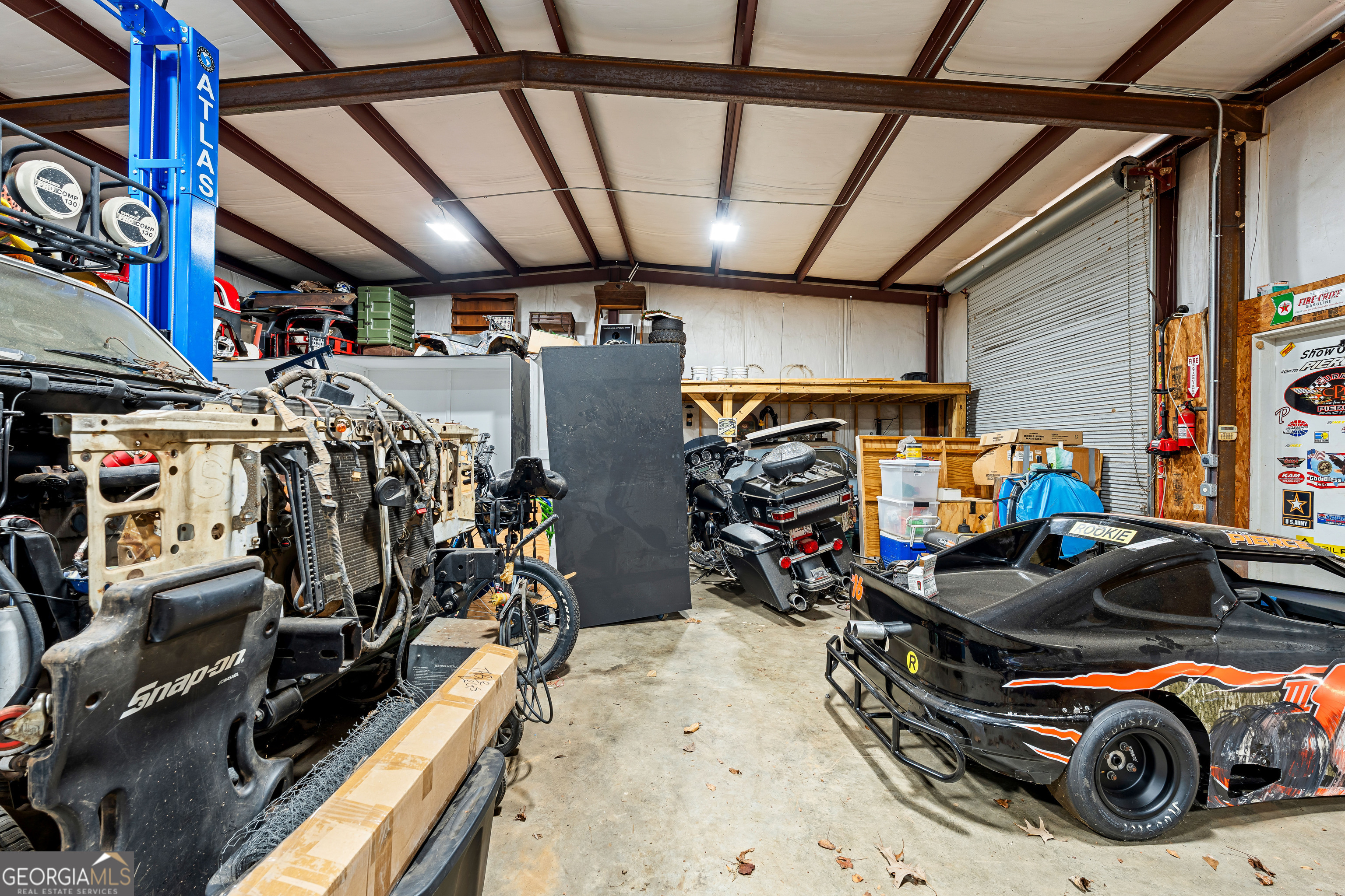 4101 West Ellis Road Griffin, GA 30223 - Photo 116 of 133 a view of a storage room with gym equipment