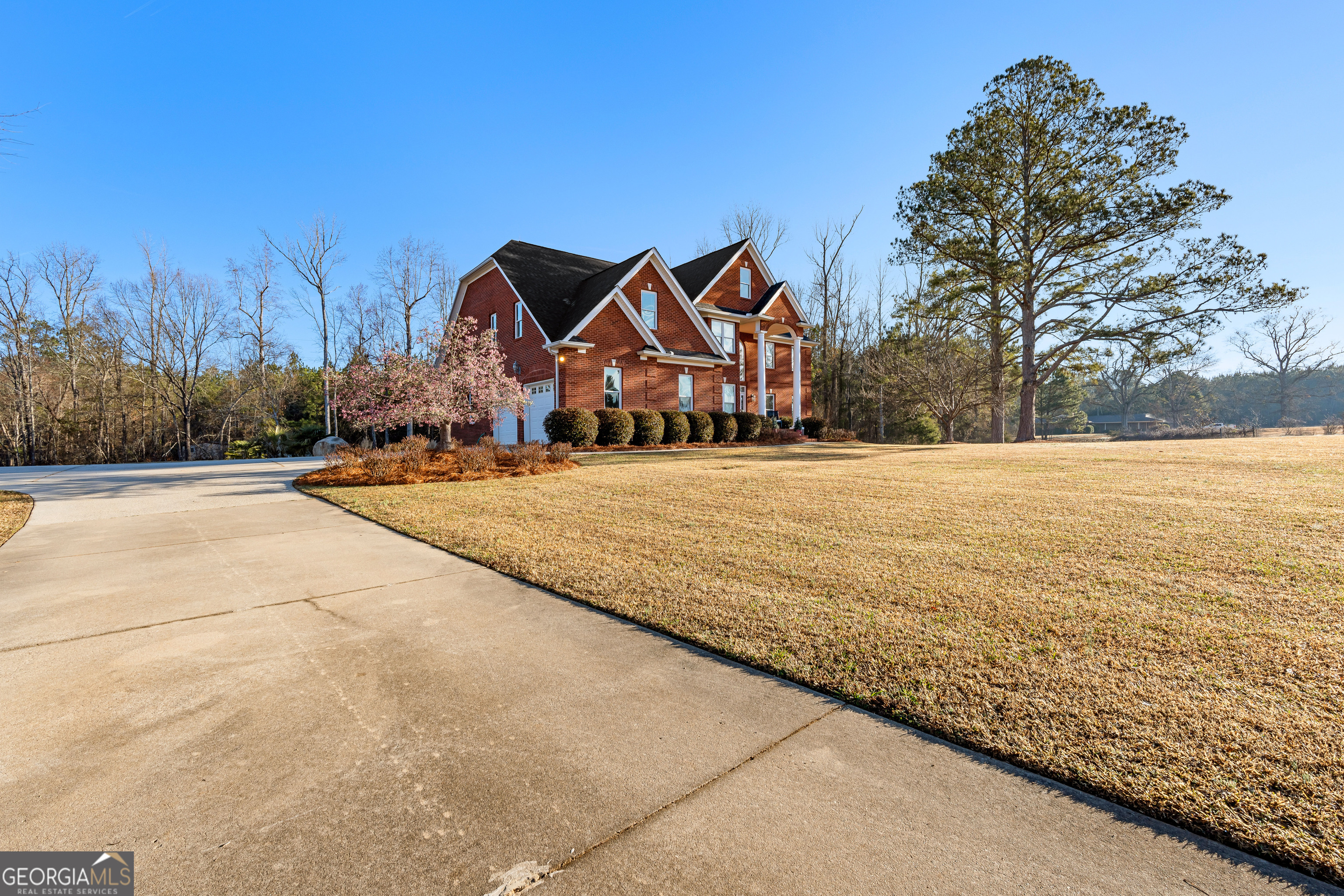 4101 West Ellis Road Griffin, GA 30223 - Photo 128 of 133 a front view of a house with a yard