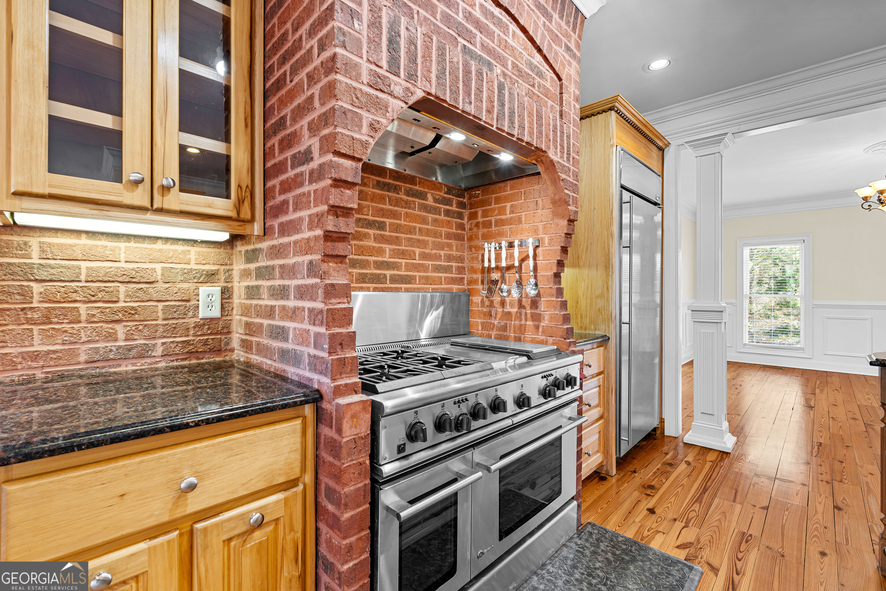 4101 West Ellis Road Griffin, GA 30223 - Photo 29 of 133 a kitchen with a stove and a microwave