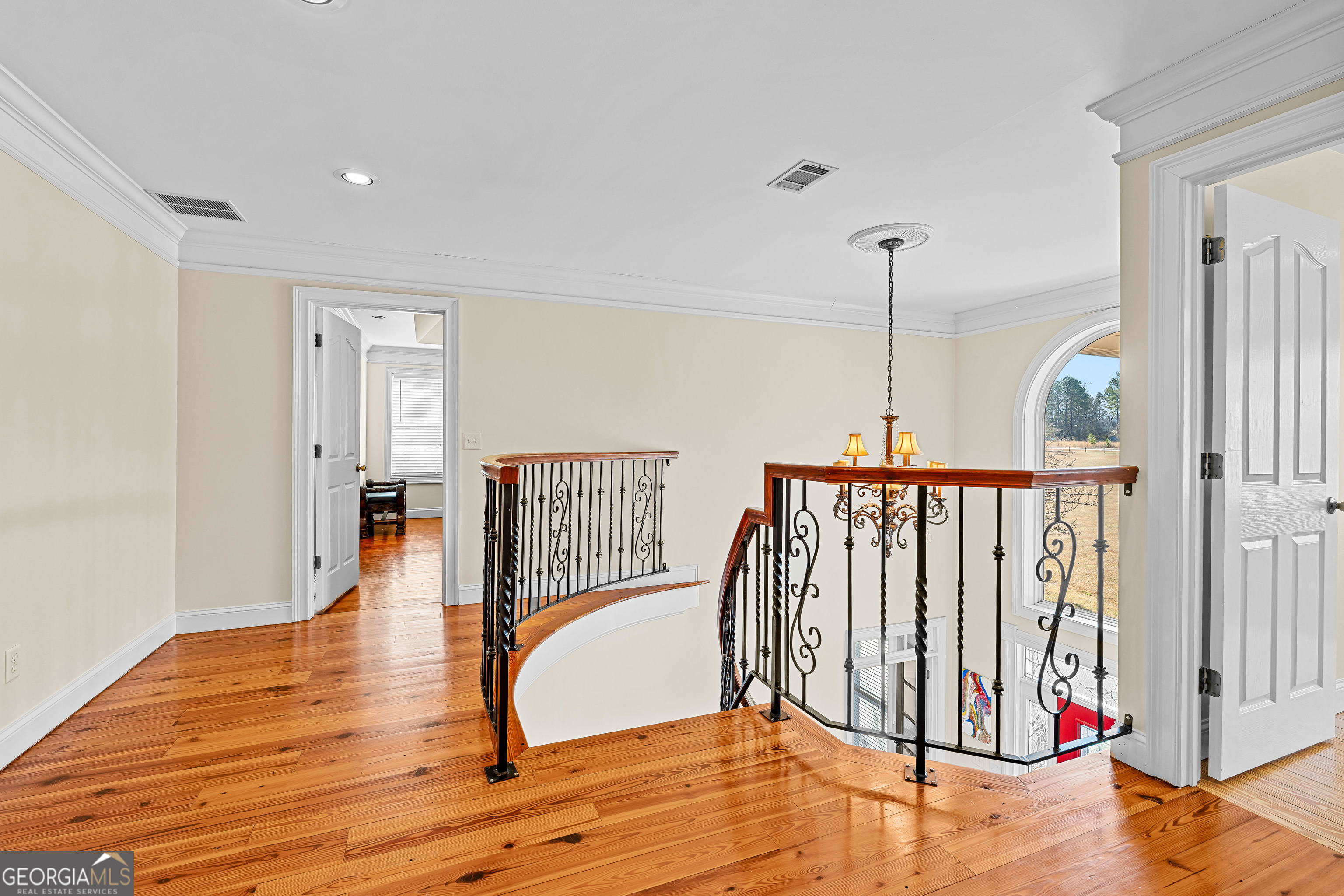 4101 West Ellis Road Griffin, GA 30223 - Photo 39 of 133 a view of entryway and hall with wooden floor