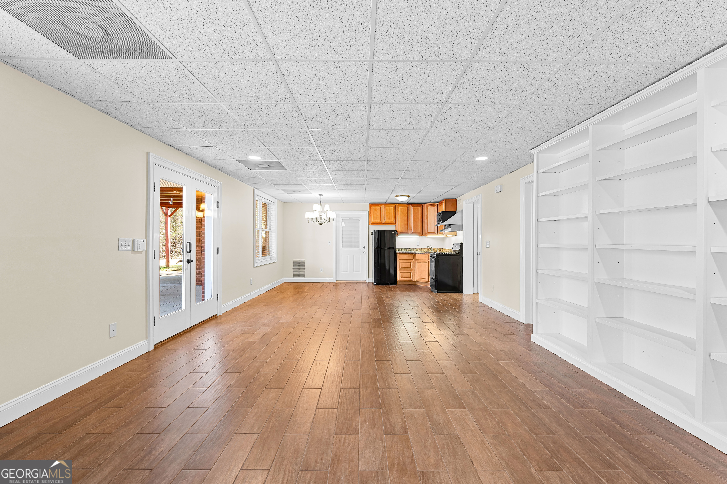 4101 West Ellis Road Griffin, GA 30223 - Photo 82 of 133 a view of empty room with wooden floor