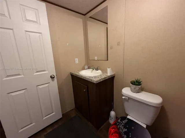 a bathroom with a sink and a toilet
