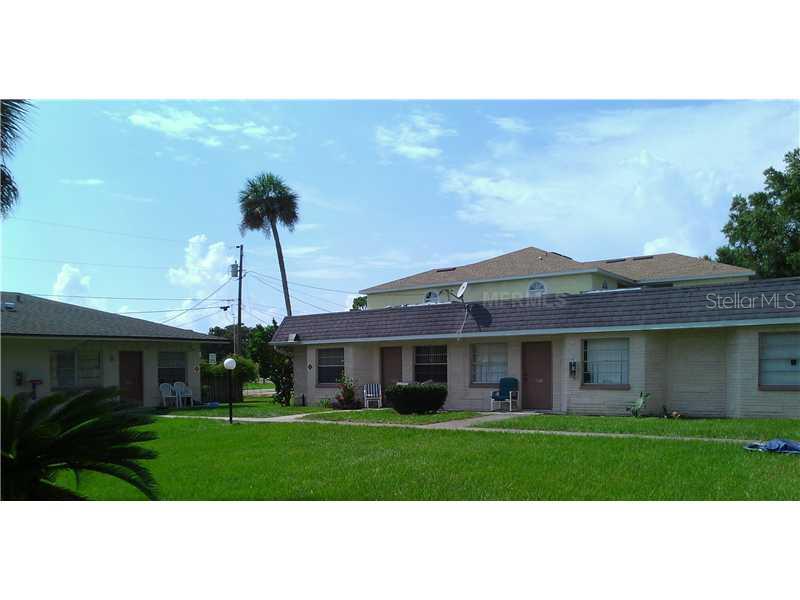 5313 Avery Road New Port Richey, FL 34652 - Photo 1 of 1 a front view of a house with a yard