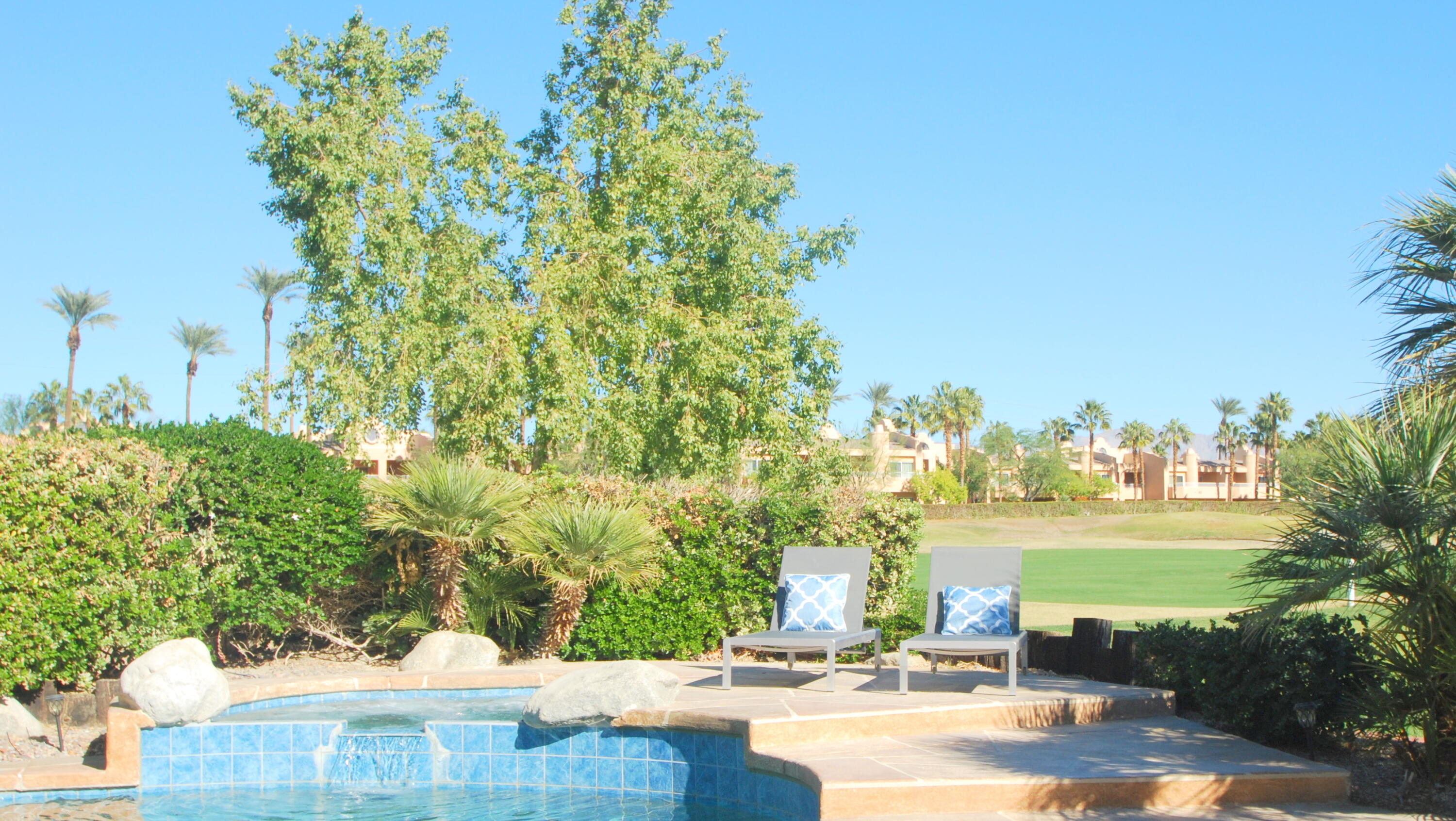 22 Pebble Beach Drive Rancho Mirage, CA 92270 - Photo 3 of 10 a view of a yard with an outdoor space