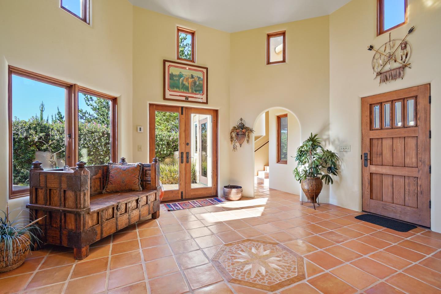 31541 Highway 1 Carmel, CA 93923 - Photo 13 of 73 a living room with furniture and a potted plant