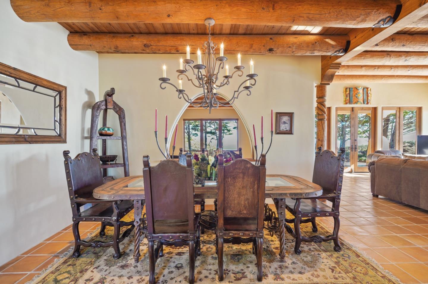 31541 Highway 1 Carmel, CA 93923 - Photo 17 of 73 a view of a dining room with furniture and chandelier