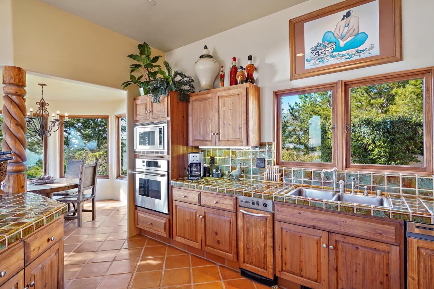 31541 Highway 1 Carmel, CA 93923 - Photo 21 of 73 a very nice looking kitchen with a large window appliances and cabinets
