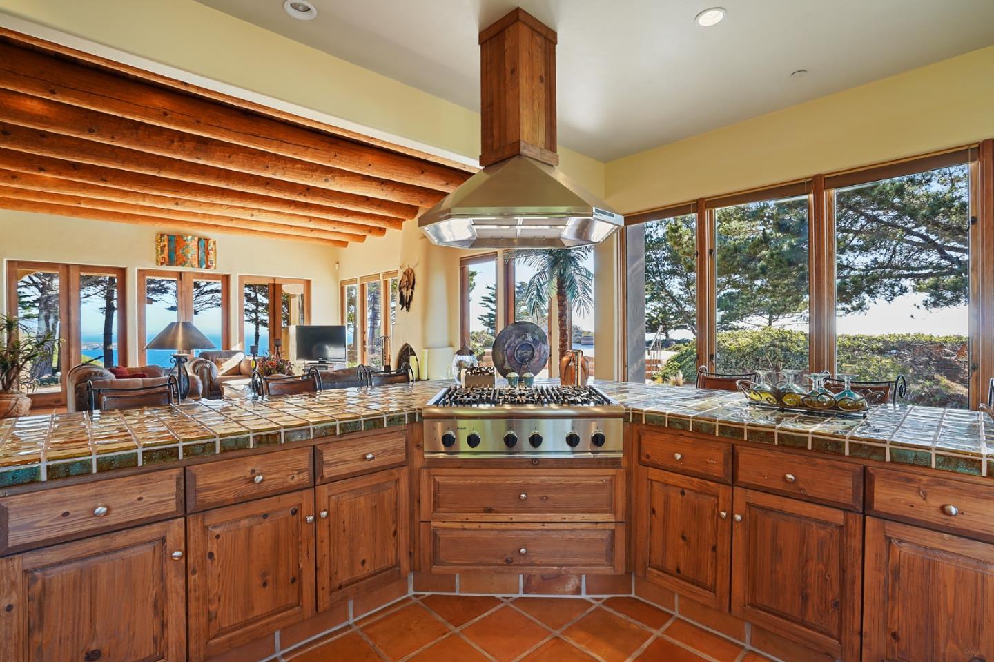 31541 Highway 1 Carmel, CA 93923 - Photo 26 of 73 a kitchen with stainless steel appliances granite countertop a stove and cabinets
