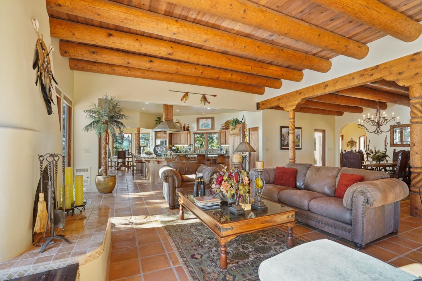 31541 Highway 1 Carmel, CA 93923 - Photo 30 of 73 a living room with furniture and a chandelier