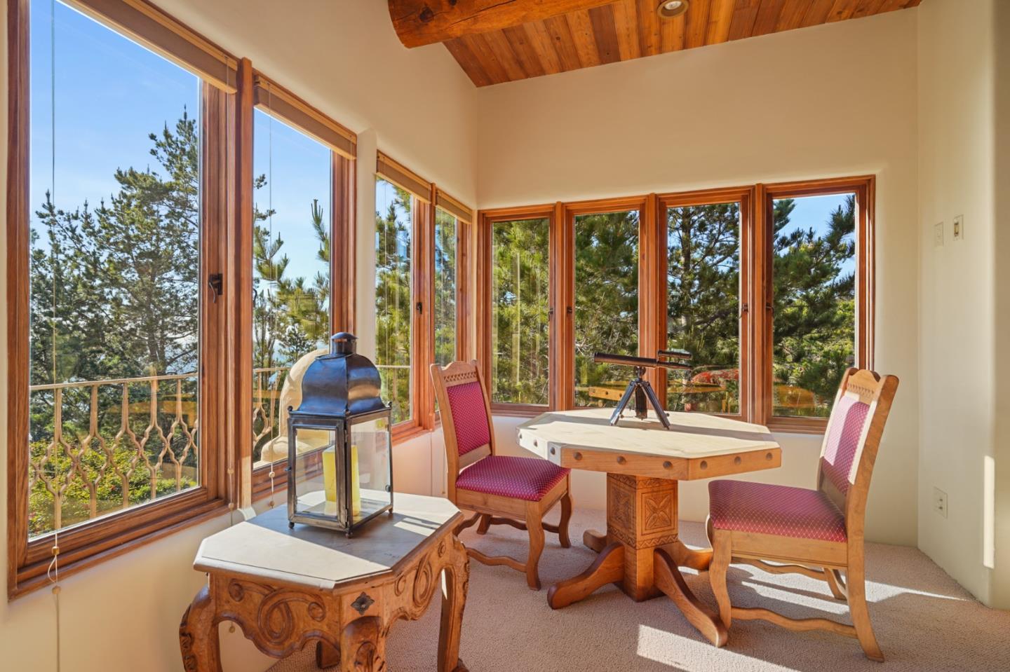 31541 Highway 1 Carmel, CA 93923 - Photo 37 of 73 a view of a dining room with furniture window and outside view