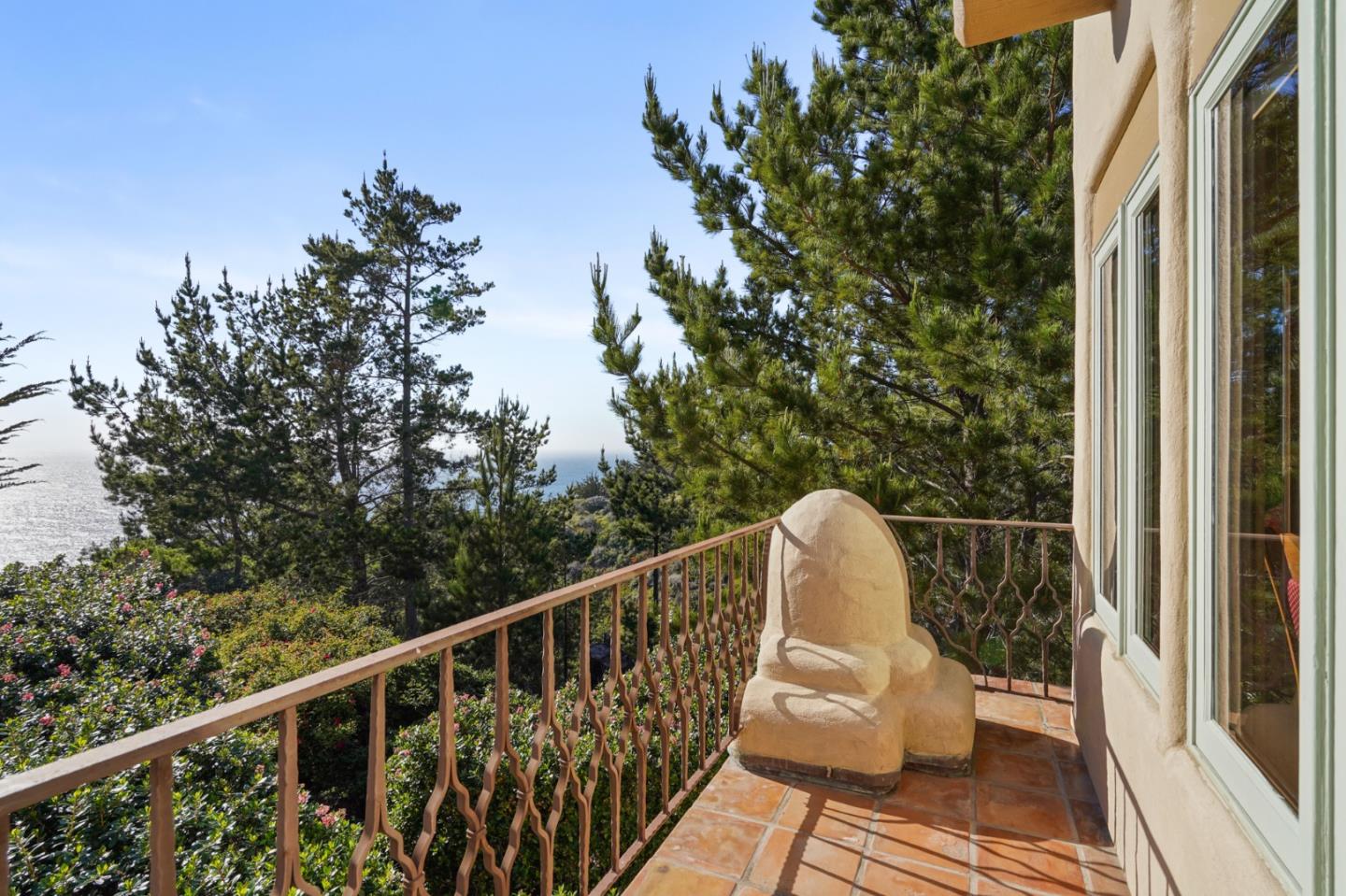 31541 Highway 1 Carmel, CA 93923 - Photo 38 of 73 a balcony with wooden floor and outdoor space