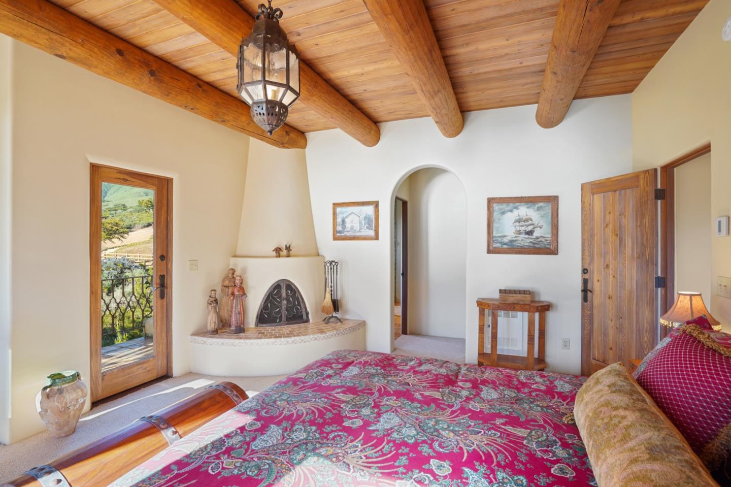 31541 Highway 1 Carmel, CA 93923 - Photo 40 of 73 a bedroom with a bed and a window