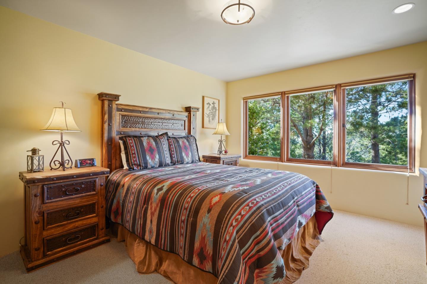 31541 Highway 1 Carmel, CA 93923 - Photo 45 of 73 a bedroom with a bed and a window