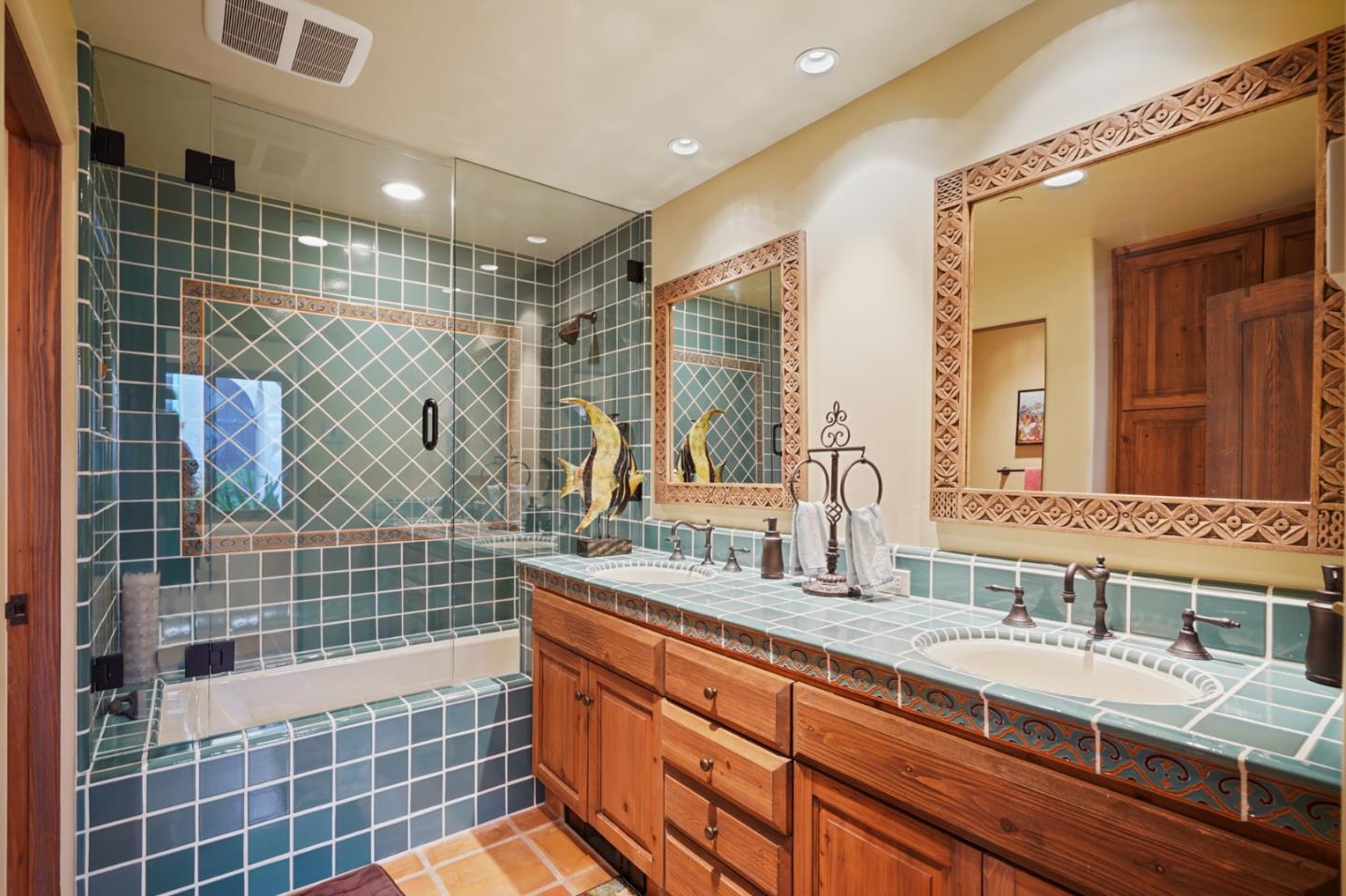 31541 Highway 1 Carmel, CA 93923 - Photo 46 of 73 a bathroom with a granite countertop sink mirror and double