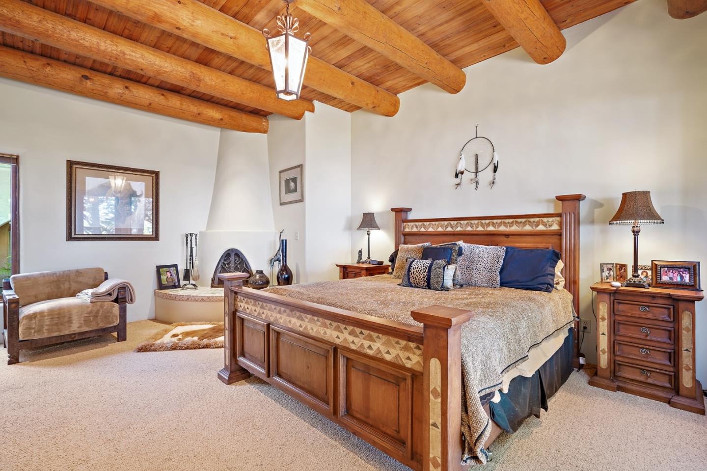 31541 Highway 1 Carmel, CA 93923 - Photo 52 of 73 a bedroom with a bed a couch and dresser