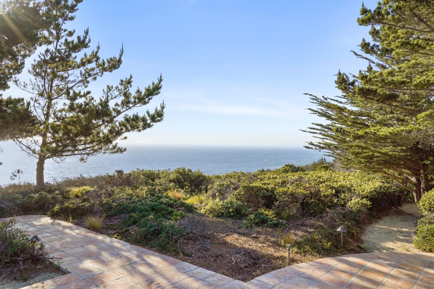 31541 Highway 1 Carmel, CA 93923 - Photo 58 of 73 a view of a lake with a mountain