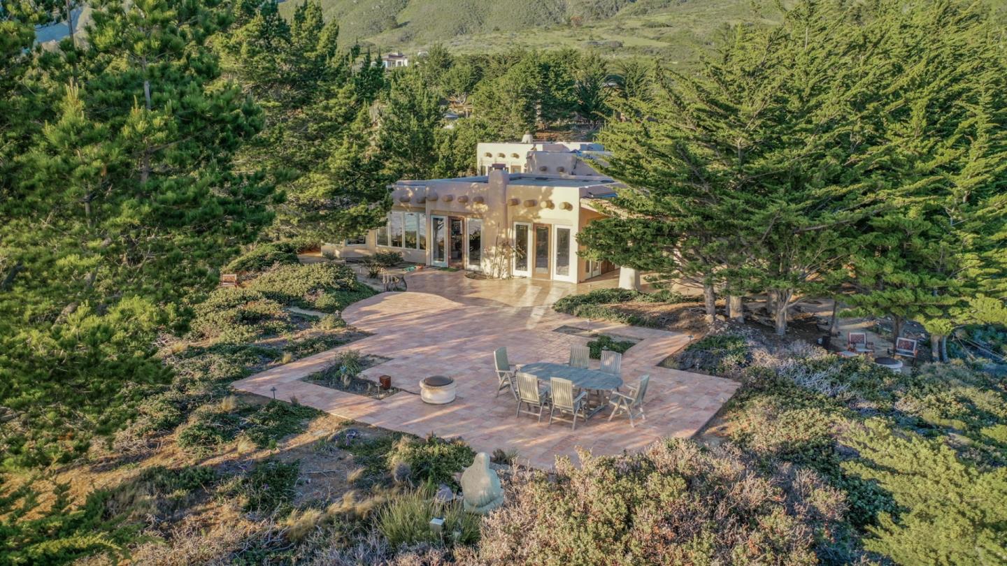 31541 Highway 1 Carmel, CA 93923 - Photo 7 of 73 a view of a house with a yard