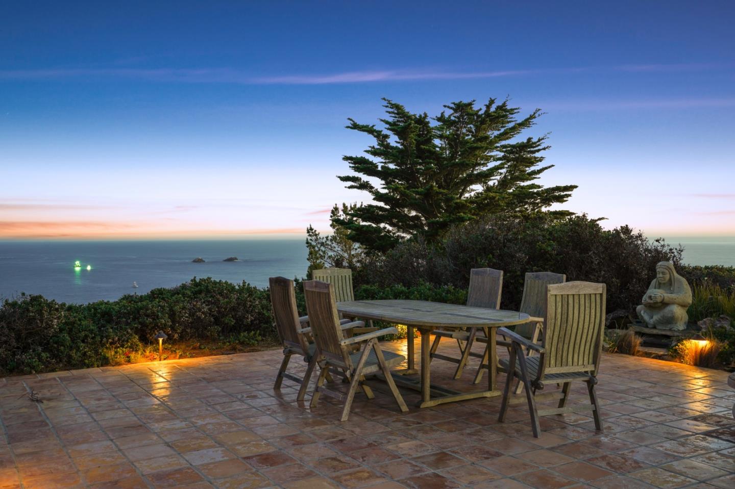 31541 Highway 1 Carmel, CA 93923 - Photo 71 of 73 a view of a chairs and table on the terrace