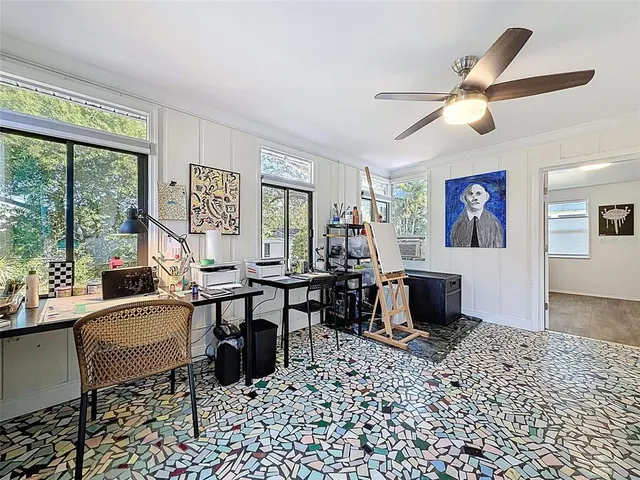 a work room with a large window