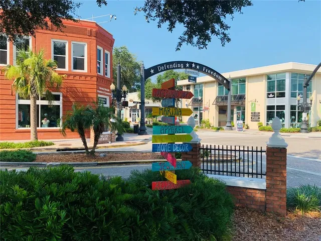 a front view of building with garden