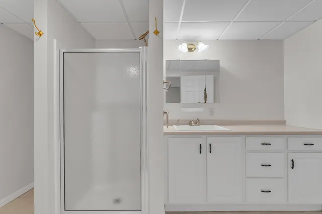 an aerial view of a houses with a yard