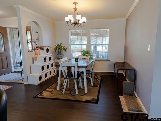 495 Wilcox Drive Rusk, TX 75785 - Photo 11 of 37 a view of a dining room with furniture window and wooden floor