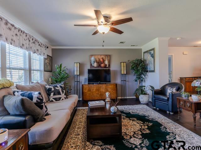 495 Wilcox Drive Rusk, TX 75785 - Photo 15 of 37 a living room with furniture fireplace and a large window