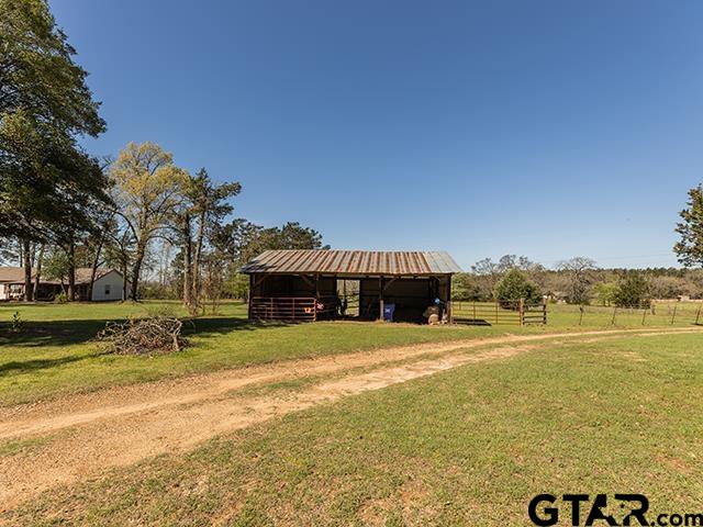 495 Wilcox Drive Rusk, TX 75785 - Photo 36 of 37 a view of a house with a yard and a large tree