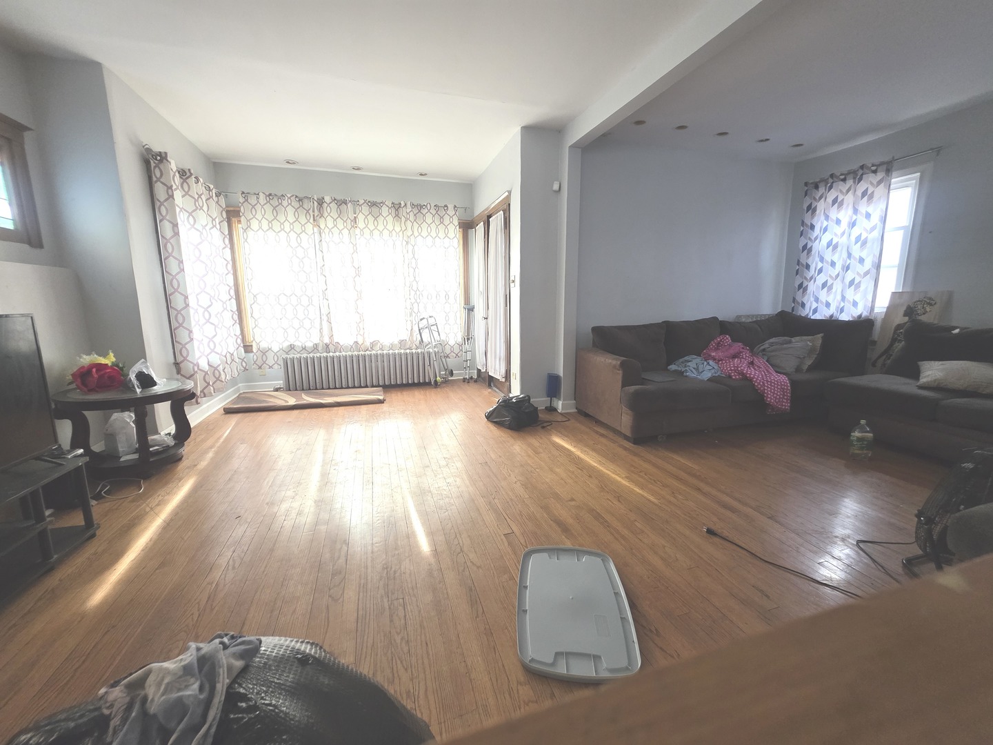 7545 South Merrill Avenue Chicago, IL 60649 - Photo 3 of 12 a living room with furniture and a large window