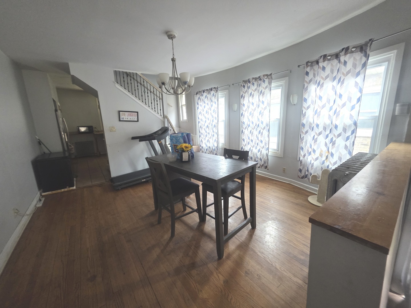7545 South Merrill Avenue Chicago, IL 60649 - Photo 4 of 12 a view of a dining room with furniture window and outside view