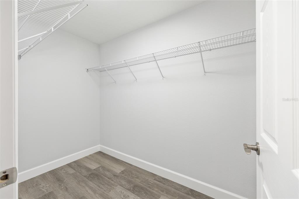 2130 Southwest 159th Court Ocala, FL 34481 - Photo 20 of 27 a view of a room with racks on the wall