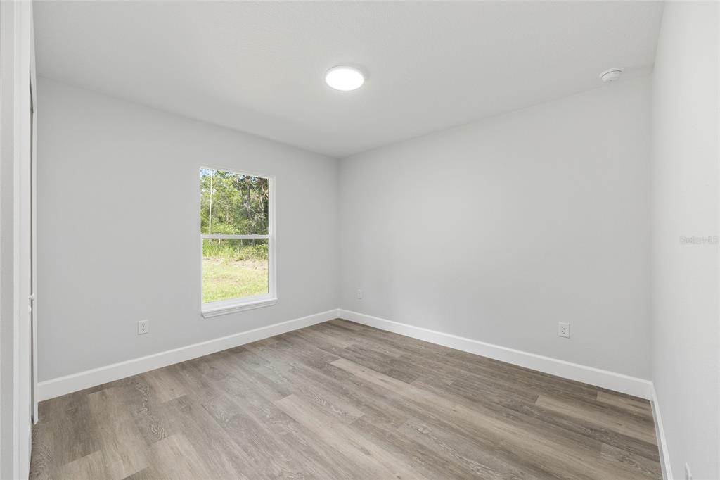 2130 Southwest 159th Court Ocala, FL 34481 - Photo 24 of 27 an empty room with a window