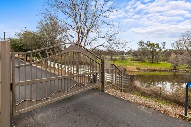a view of a lake with a yard