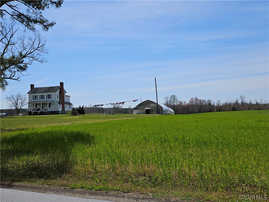 175 Raines Tavern Road Farmville, VA 23901 - Photo 20 of 46 a front view of a house with garden
