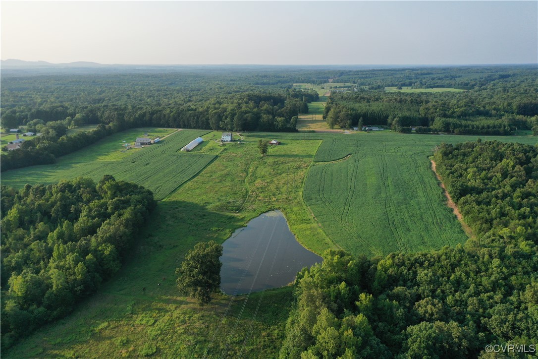 175 Raines Tavern Road Farmville, VA 23901 - Photo 2 of 46 an aerial view of a golf course with trees