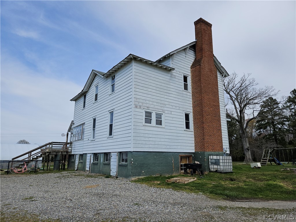 175 Raines Tavern Road Farmville, VA 23901 - Photo 22 of 46 a front view of a house with a yard