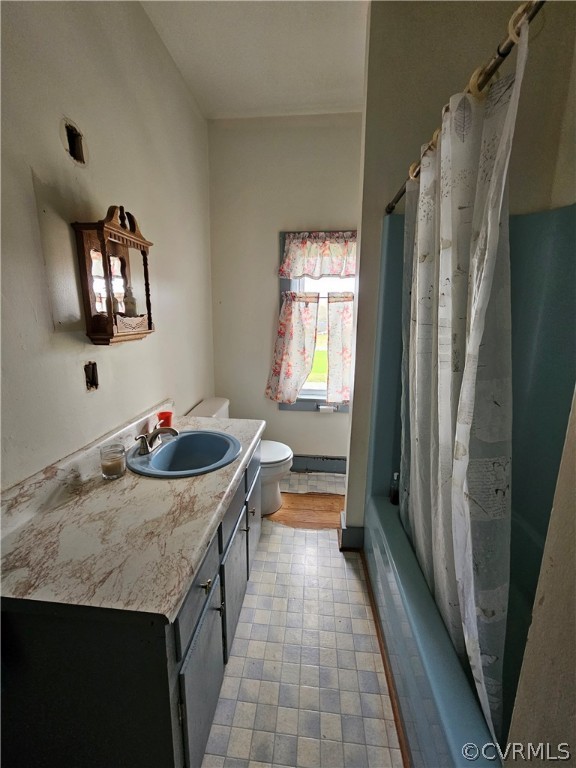 175 Raines Tavern Road Farmville, VA 23901 - Photo 40 of 46 a kitchen with a sink a stove and a refrigerator