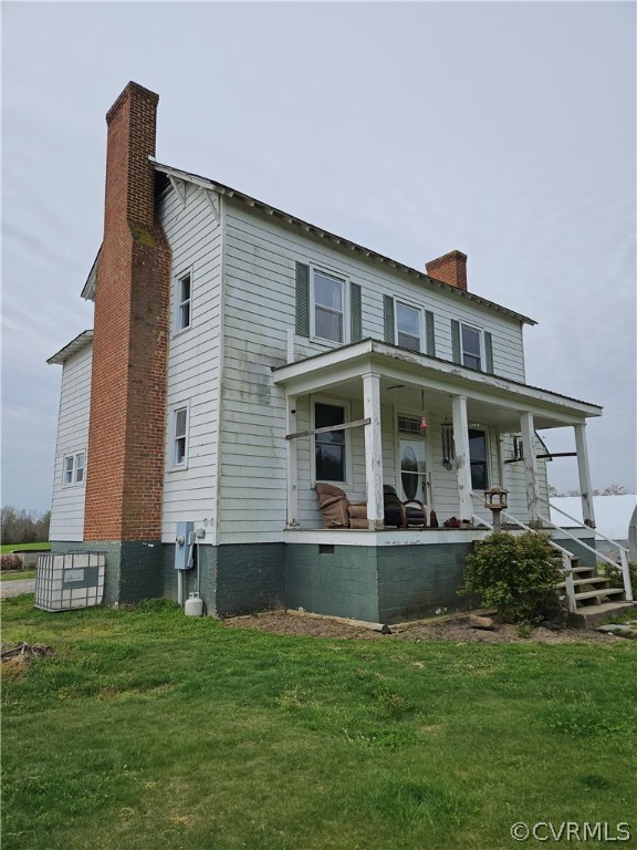 175 Raines Tavern Road Farmville, VA 23901 - Photo 45 of 46 a front view of house with a garden