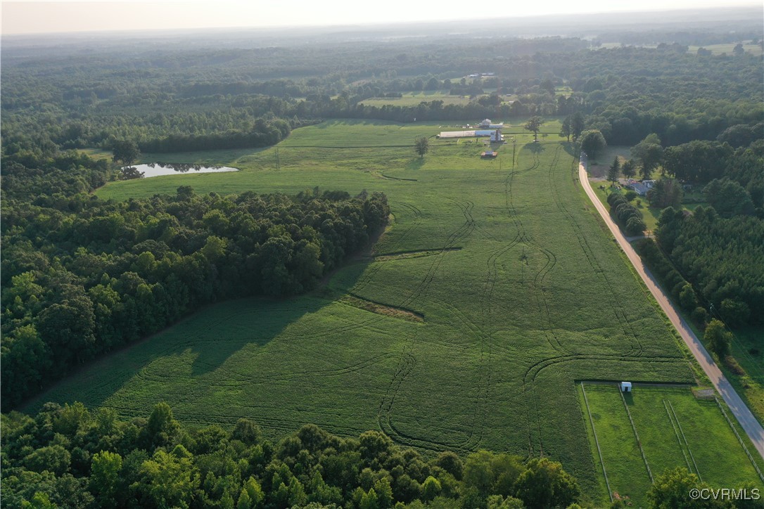 175 Raines Tavern Road Farmville, VA 23901 - Photo 7 of 46 a view of a lake with a yard