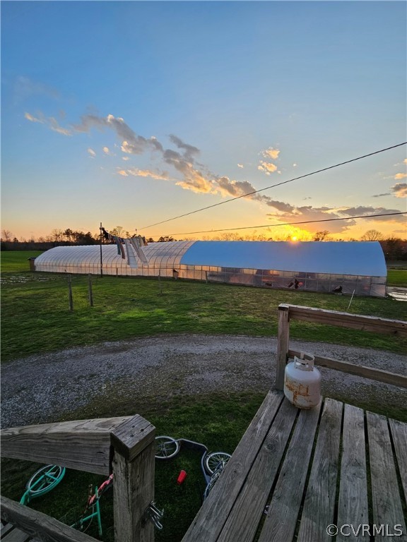 175 Raines Tavern Road Farmville, VA 23901 - Photo 9 of 46 a view of a terrace with a yard