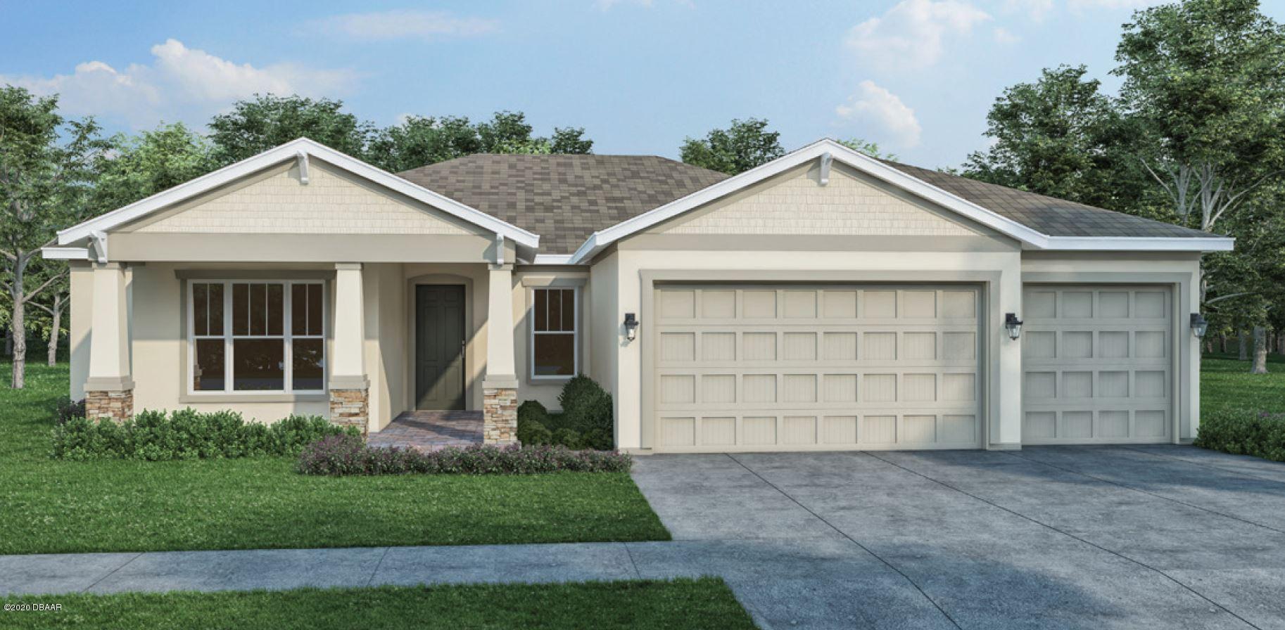 a view of a house with a yard and garage