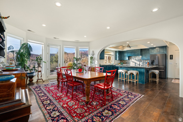 779 South Silver Road Leeds, UT 84746 - Photo 6 of 80 Dining room with arched walkways, ceiling fan, and recessed lighting