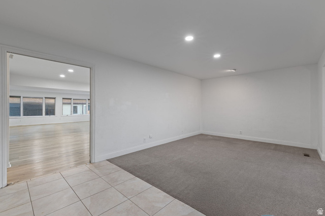 875 Cedar Hollow Road Lehi, UT 84043 - Photo 68 of 76 Recessed lighting, tile flooring, wall-to-wall carpeting, and wood-finish flooring