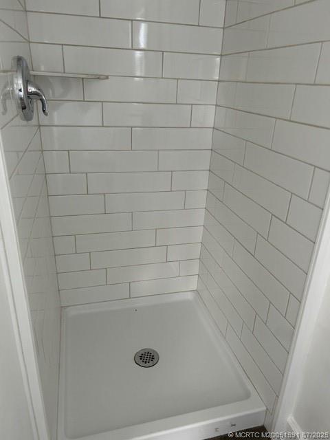 1944 Southwest College Street Stuart, FL 34997 - Photo 14 of 50 a bathroom with a shower