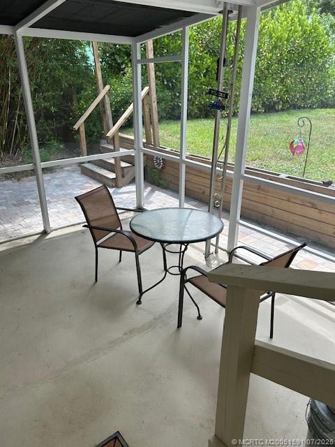 1944 Southwest College Street Stuart, FL 34997 - Photo 17 of 50 a view of a chairs and table in the patio